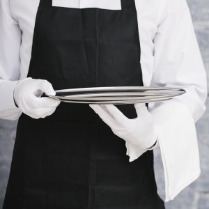 waiter-in-uniform-holding-metal-tray